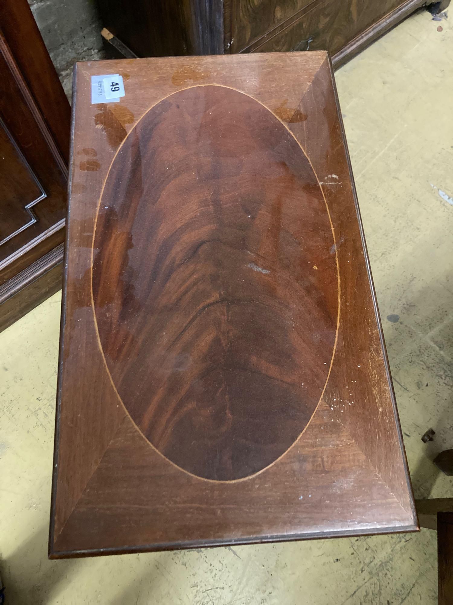 A nest of three Edwardian inlaid mahogany occasional tables, width 54cm